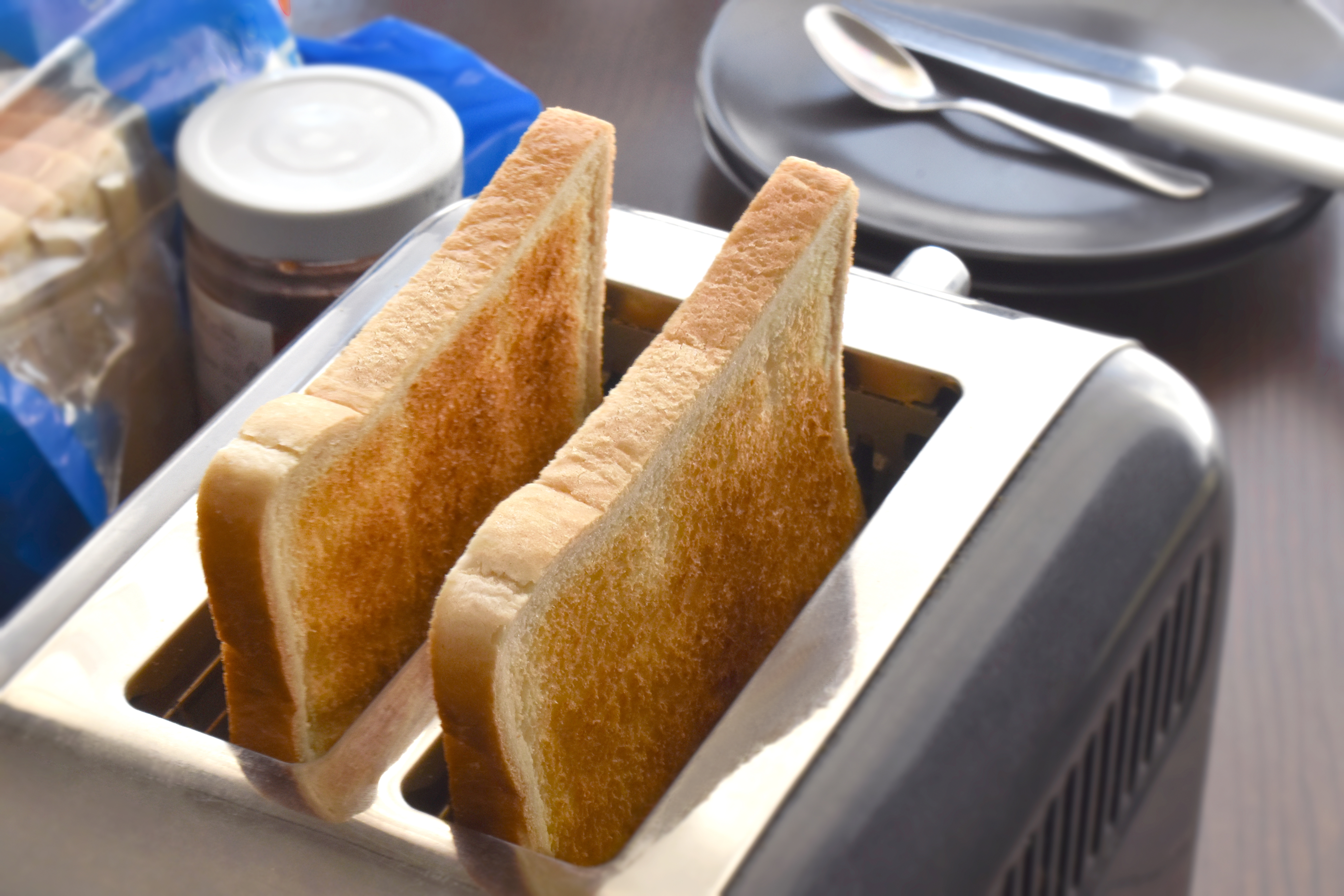 Toast in a toaster. Breakfast time at home.